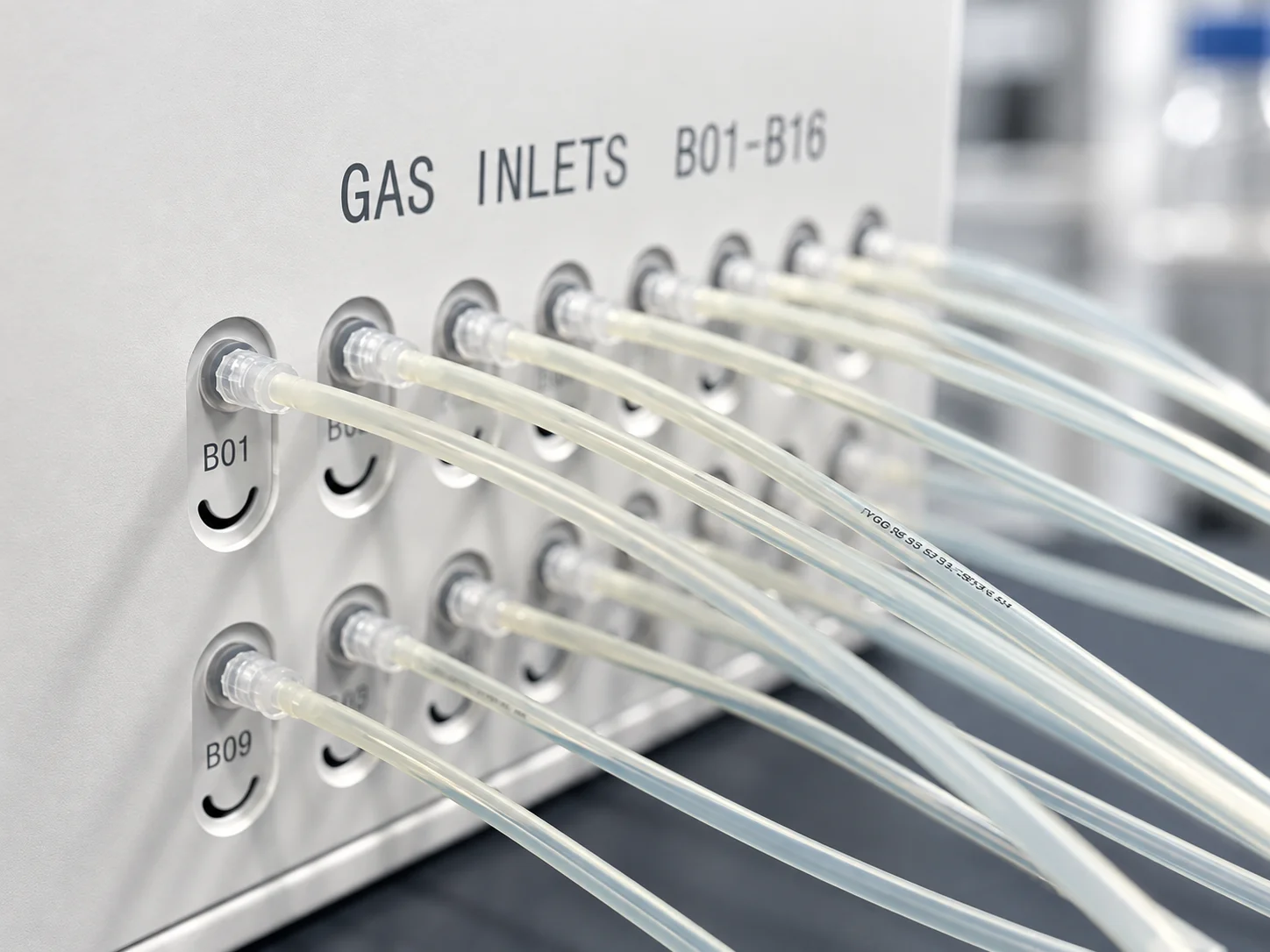 Gas hoses connected to the numbered inlets on the Chimera analyser