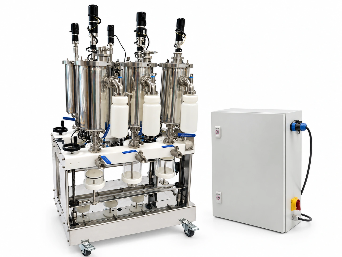 The Lobster auto-fed digester on its wheeled stainless frame beside the PLC control cabinet